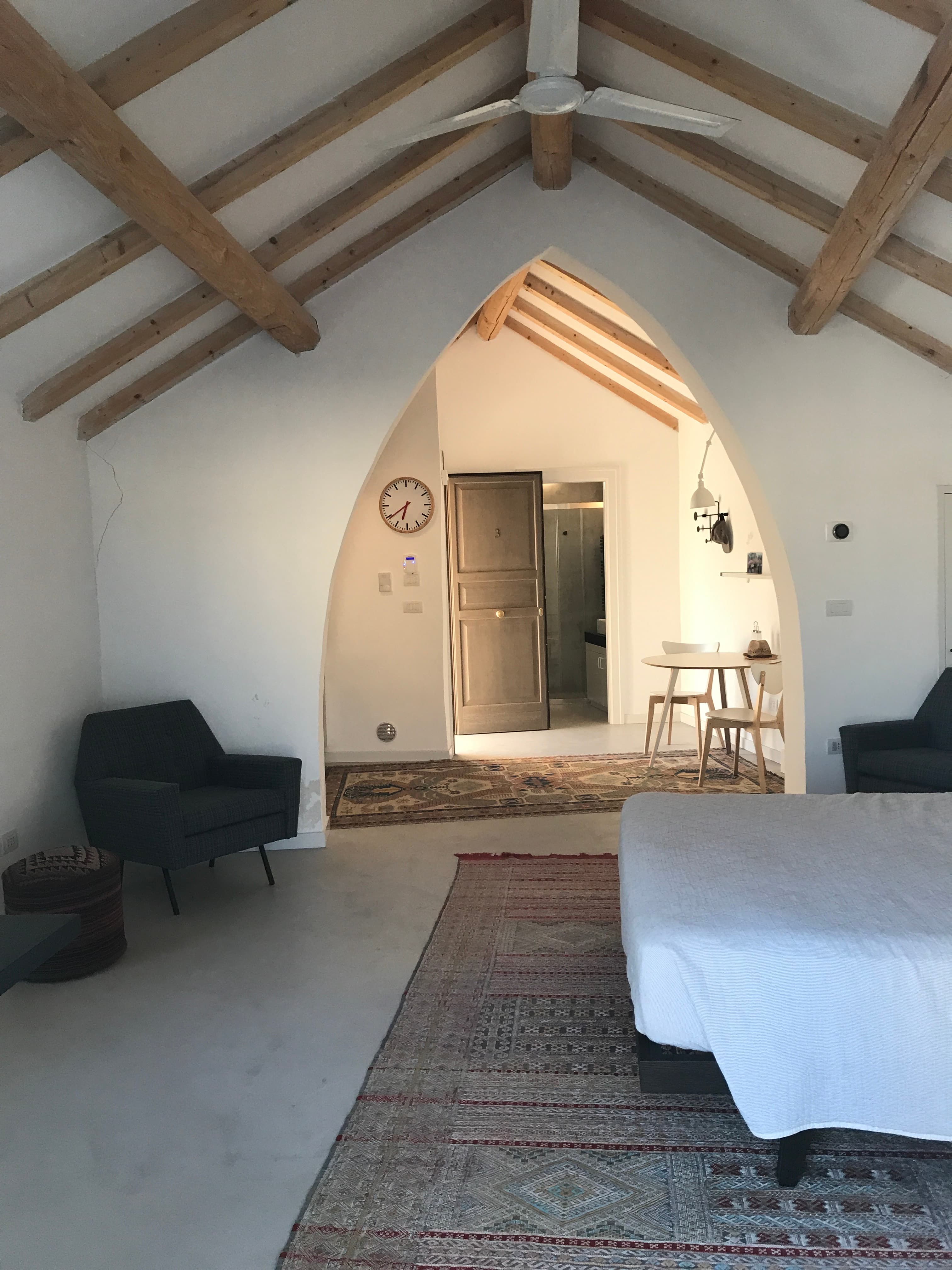 Upper studio: bathroom, kitchenette, and private terrace